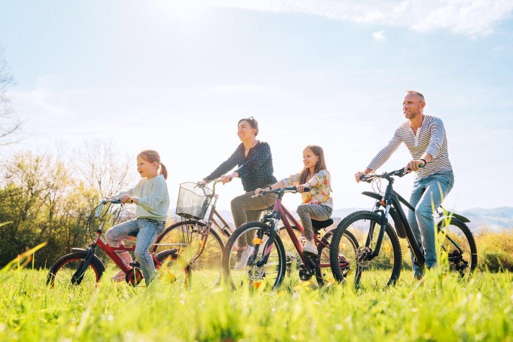 Family riding their bikes