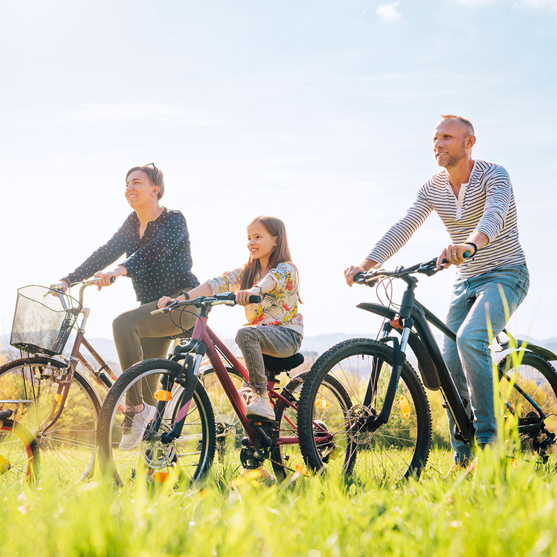 Family riding bicycles