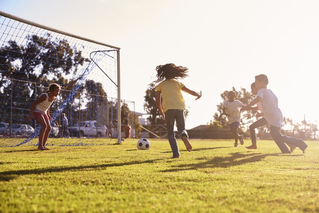 Children playing soccer